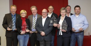 Andreas Koch (ESU), Nadine Sindlinger (Märklin), Bernd Lenz (Lenz), Michael Schwarz und Richard Storch (Busch), Ute Auhagen-Hofmann und Michael Hofmann (Auhagen) und Thomas Neuman (Roco). (Foto-Credit: MOBA) - Quelle: Westfalenhallen Dortmund GmbH